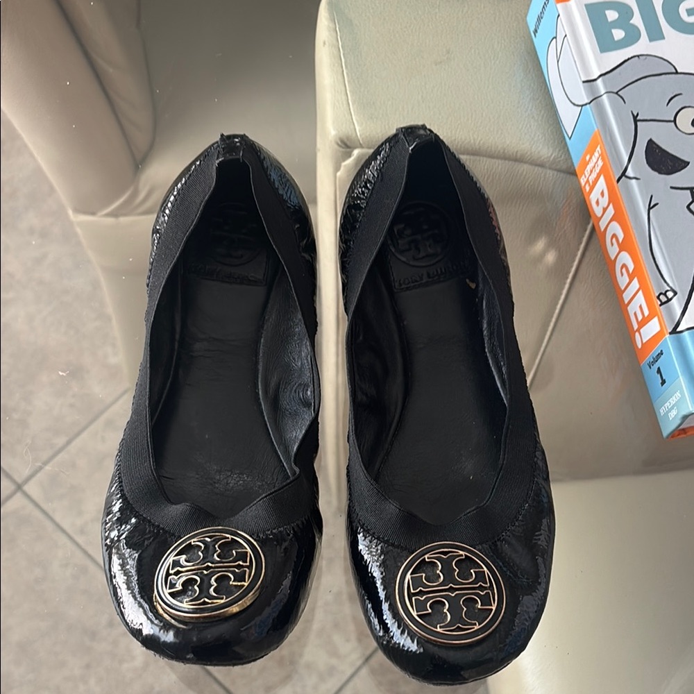 Tory Burch Shiny Black Flats with Gold Emblem